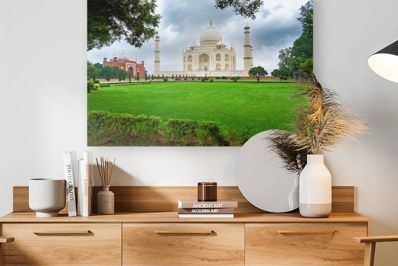 Visit to Taj Mahal in Agra India with green lawns and cloudy ski by Marco Brivio