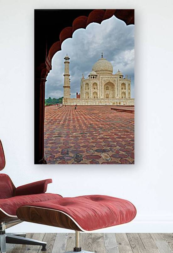 Exploring the view of Taj Mahal from an archway in Agra by Marco Brivio