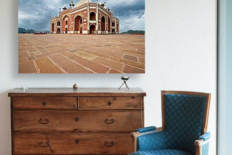 Humayuns Tomb stands in Delhi under a cloudy sky by Marco Brivio