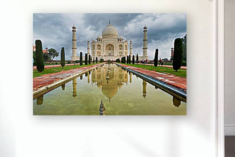 Visitors explore the Taj Mahal Palace in cloudy Agra by Marco Brivio