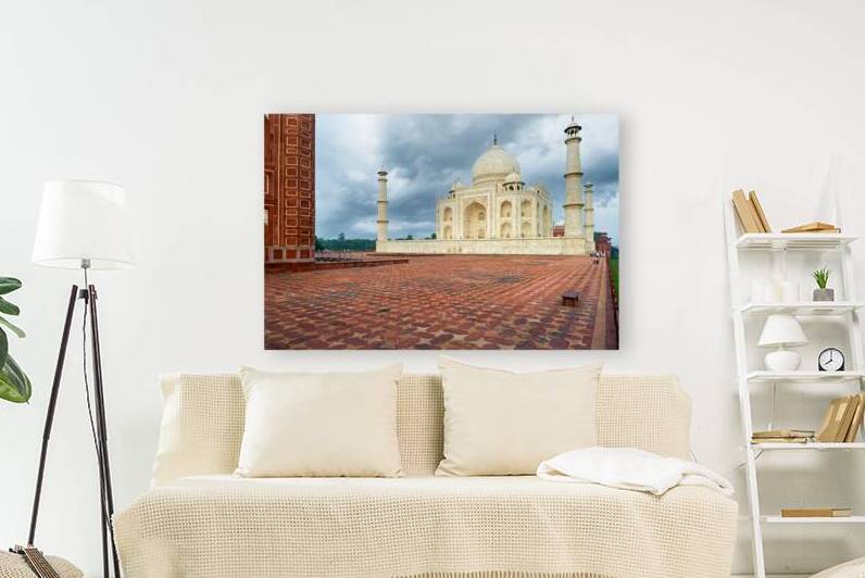Exploring the Taj Mahal Palace in Agra India during cloudy weath by Marco Brivio