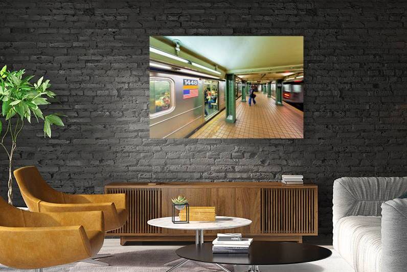 People wait at Manhattan subway station in New York City by Marco Brivio