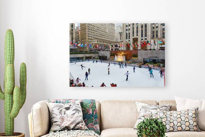 Ice skaters enjoy the rink at Rockefeller Center in Manhattan by Marco Brivio
