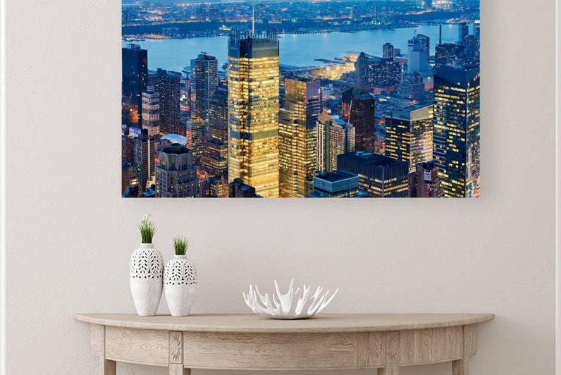 Aerial view of Manhattan skyline at dusk over New York City by Marco Brivio