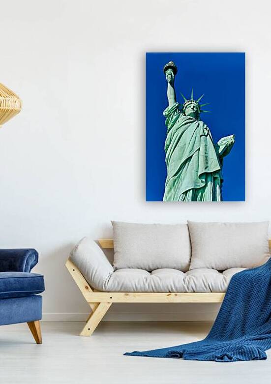 Statue of Liberty stands tall on Liberty Island in New York by Marco Brivio