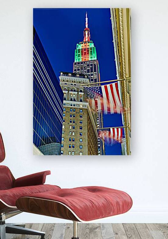 Empire State Building shines above Manhattan at dusk in New York by Marco Brivio