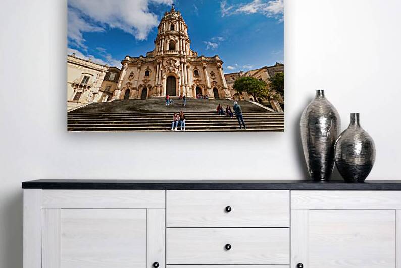 Duomo of San Giorgio stands tall in Modica Sicily under blue sk by Marco Brivio