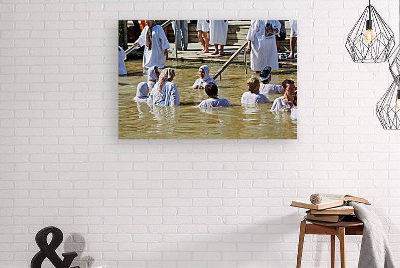 Baptism at the Jordan River in the historic site of Jesus bapti by Marco Brivio