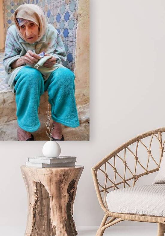 Beggar sitting in Fez Morocco with worn clothes and hands by Marco Brivio