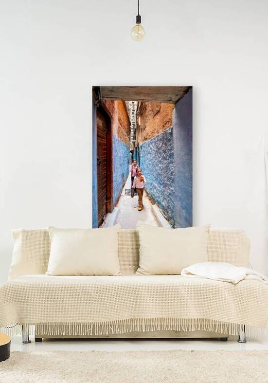 Children play in the alleys of the Medina in Fez Morocco by Marco Brivio