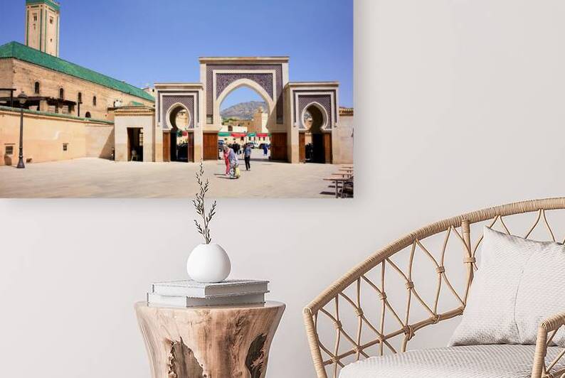 Visitors walk through Bab Rcif gate in Fez Morocco during the d by Marco Brivio