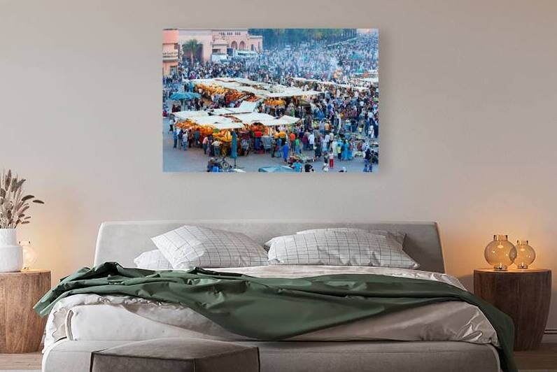 Sunset at Djema el Fna square in Marrakesh with lively crowds by Marco Brivio