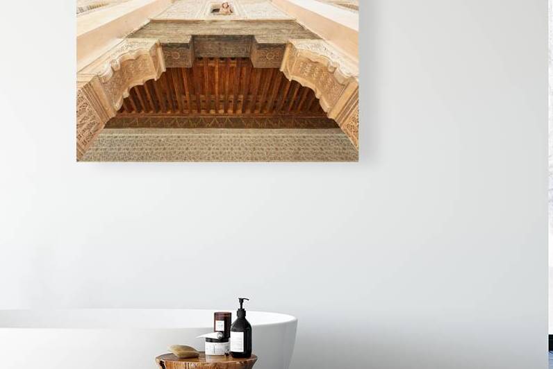 Child looks out from window of Madrasa Ben Youssef in Marrakesh by Marco Brivio