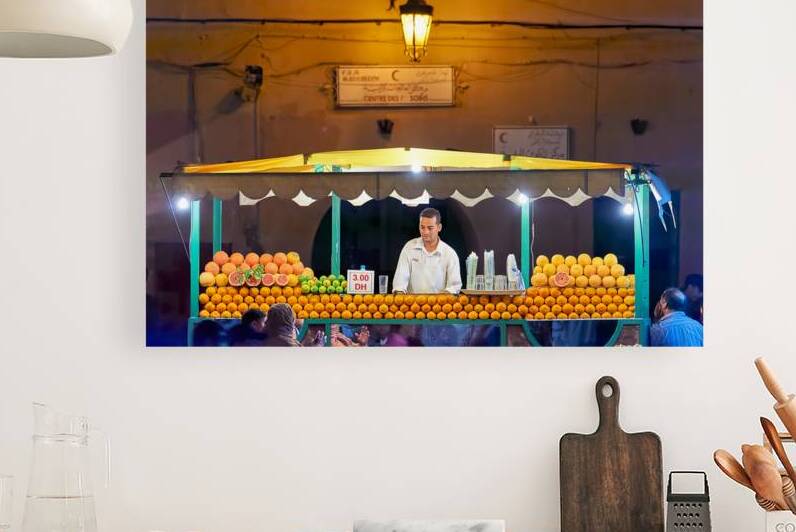 Orange juice stall in Marrakesh with fresh fruits at night by Marco Brivio