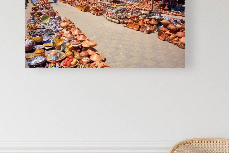 Pottery market scene in Meknes Morocco shows vibrant goods for s by Marco Brivio