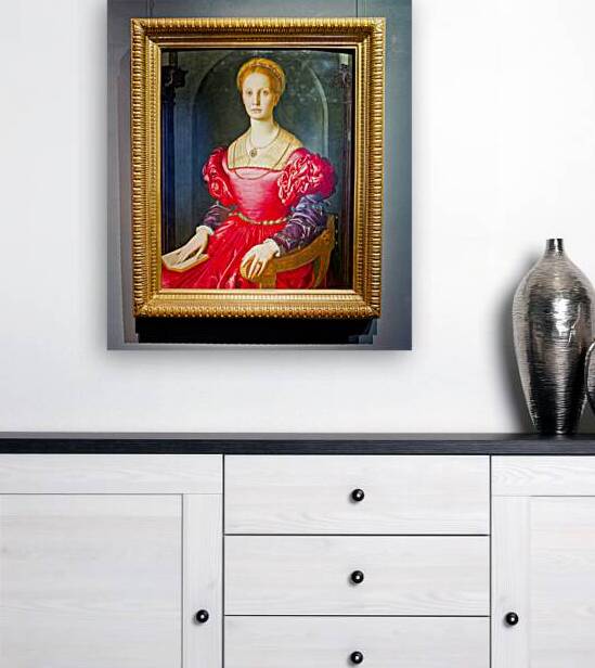 Lucrezia Panciatichi sits in a chair holding a book by Marco Brivio