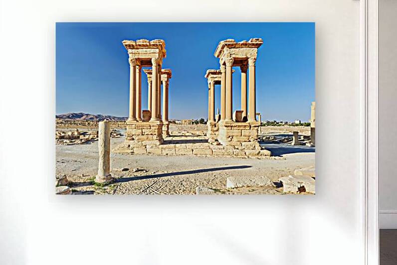 Exploring the Tetrapylon at Palmyra in Syria during the day by Marco Brivio