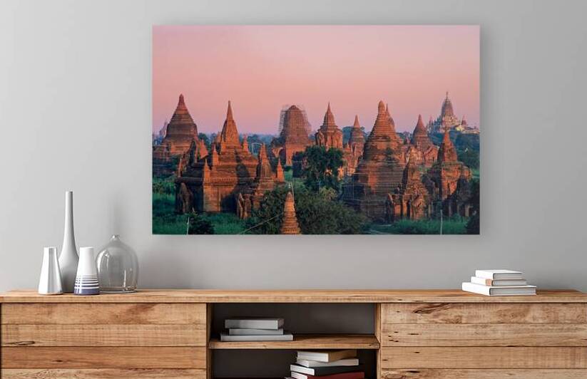 Temples in Bagan at dusk with a clear sky over Myanmar by Marco Brivio