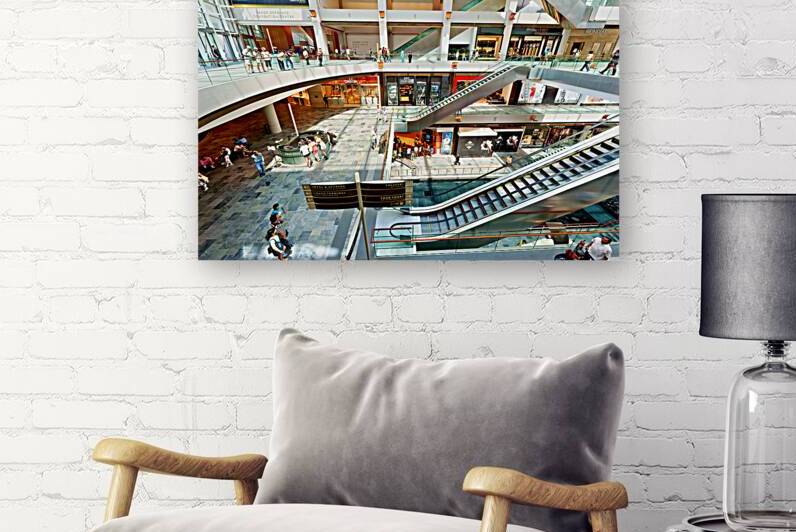 Shoppers browse stores at Marina Bay Sands Mall in Singapore by Marco Brivio