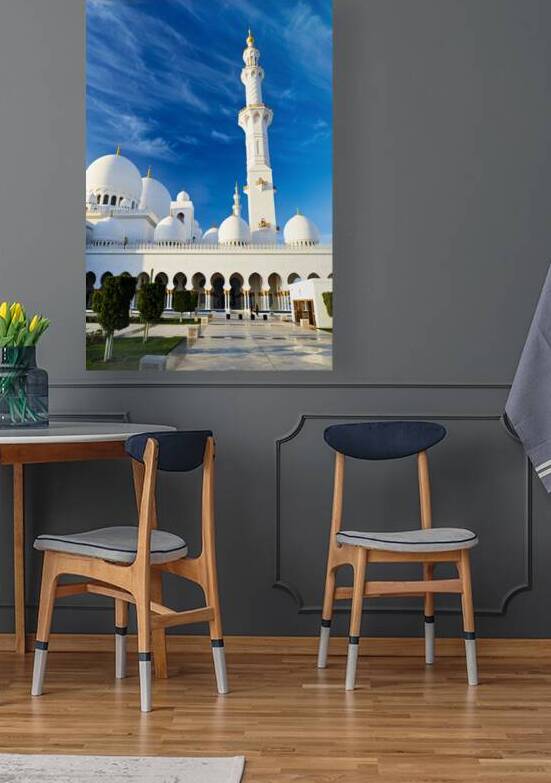 White marble mosque in Abu Dhabi during daytime view by Marco Brivio