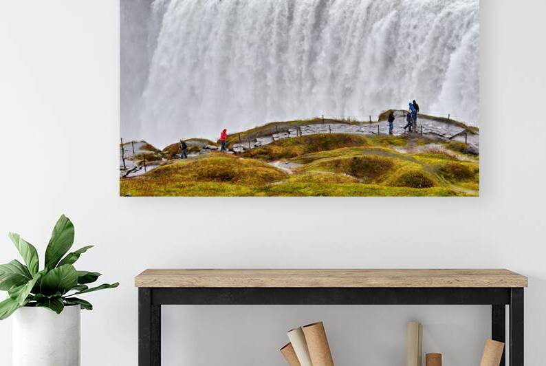 Visitors by Dettifoss waterfall in cloudy Iceland by Marco Brivio