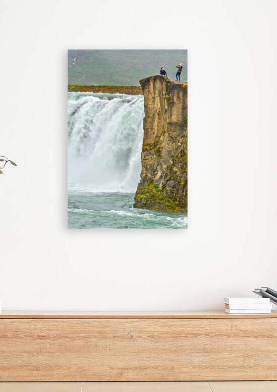 People standing near Godafoss waterfall in Iceland by Marco Brivio