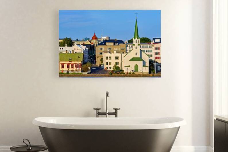 Lutheran free church in reykjavik by lake tjornin by Marco Brivio