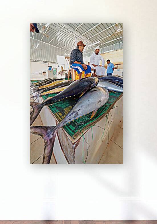 Fish being sold at the market in Muscat Oman during the day by Marco Brivio