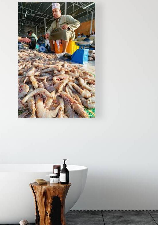 Fish market in Muscat Oman shows vendor and fresh catch by Marco Brivio