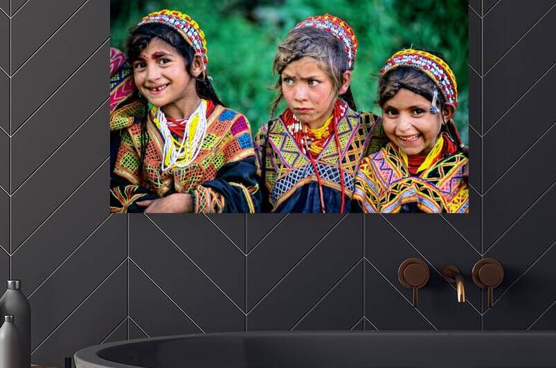 Kalash children in traditional dress in Bumburet Valley by Marco Brivio