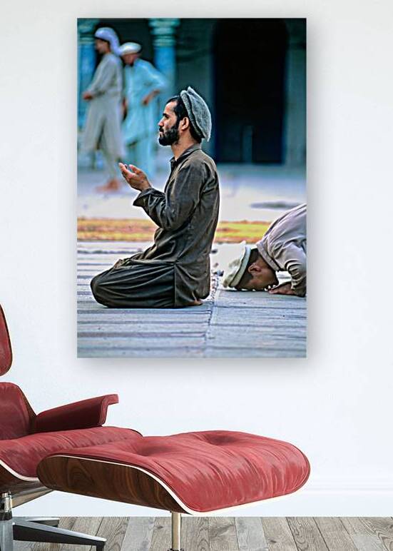 Prayers in the mosque of Chitral Pakistan at sunset by Marco Brivio