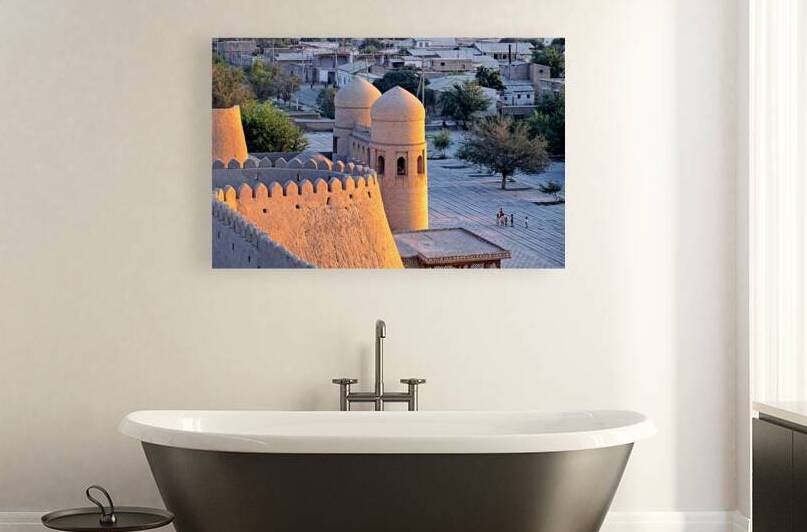 View of Khiva in Uzbekistan with historic buildings and people by Marco Brivio