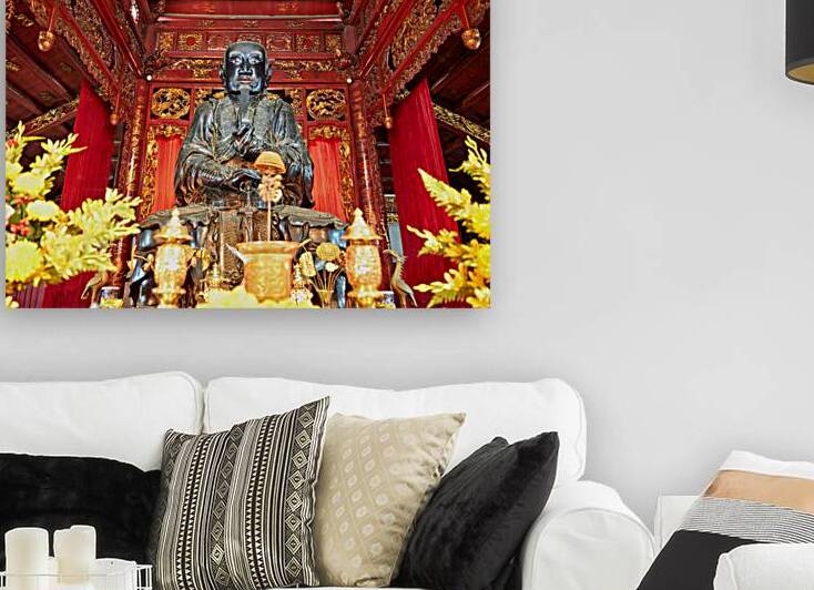 Statue of a Buddha in a temple in Ho Chi Minh City by Marco Brivio