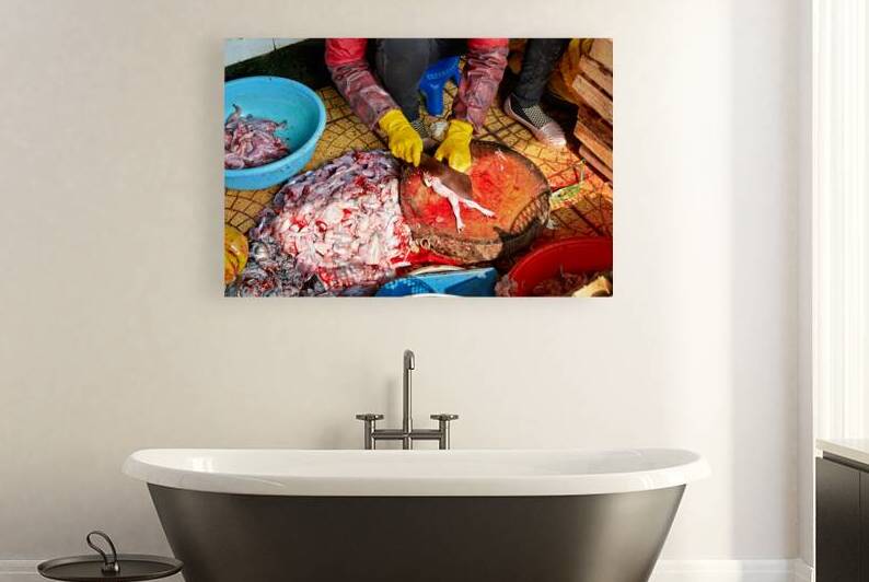 Market activity in Hanoi with fish preparation in progress by Marco Brivio