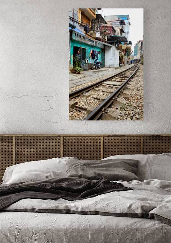 Locals near train tracks in Ho Chi Minh City Vietnam by Marco Brivio