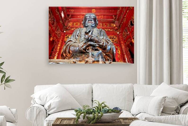 Statue of Buddha in Ho Chi Minh City temple area by Marco Brivio