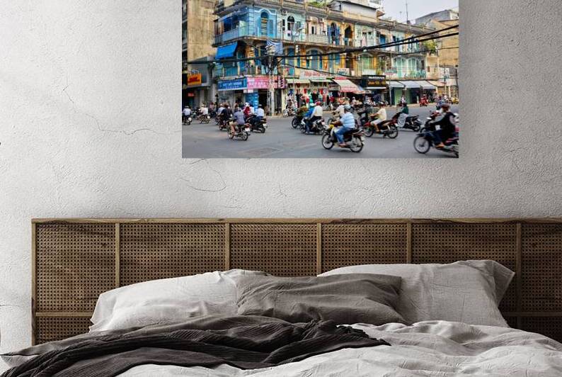 Busy street scene in Ho Chi Minh City with motorbikes and shops by Marco Brivio