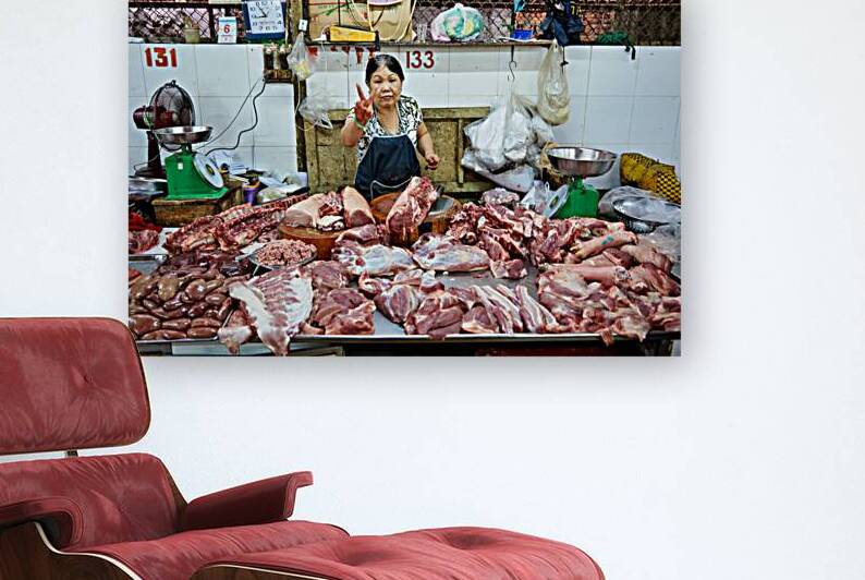 Market scene in Ho Chi Minh City with meat vendor by Marco Brivio