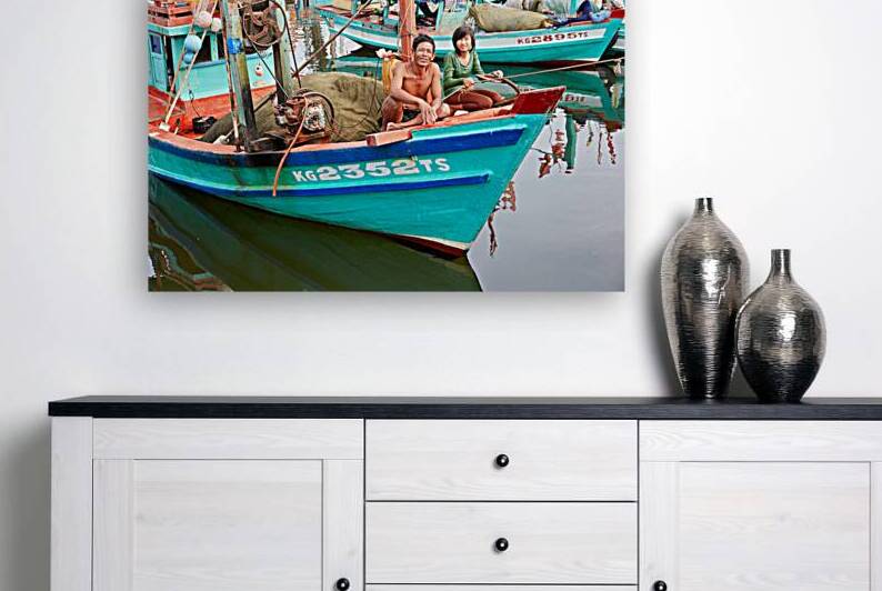 Fishing boats on Phu Quoc island in Vietnam with locals by Marco Brivio