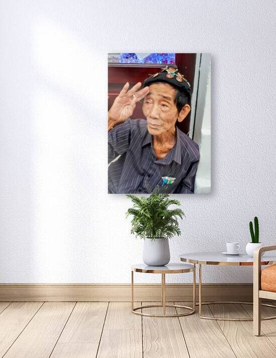 Old man salutes in Ho Chi Minh City streets by Marco Brivio