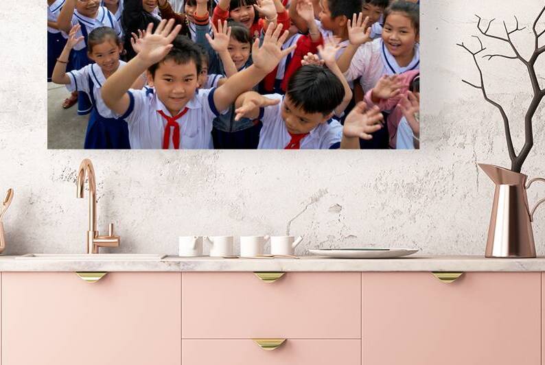 Students greet visitors in Phu Quoc Vietnam during school time by Marco Brivio