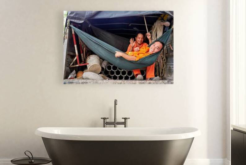 Workers relax in a truck in Ho Chi Minh City Vietnam by Marco Brivio