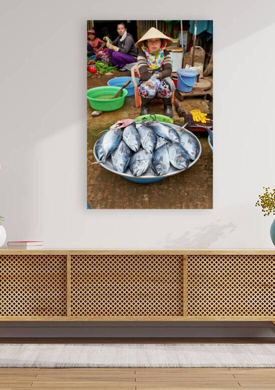 Fishing woman at market in Phu Quoc Vietnam during the day by Marco Brivio