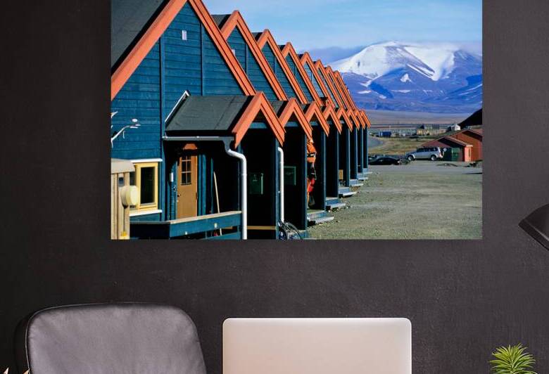 Colorful cabins line the street in Longyearbyen Svalbard by Marco Brivio