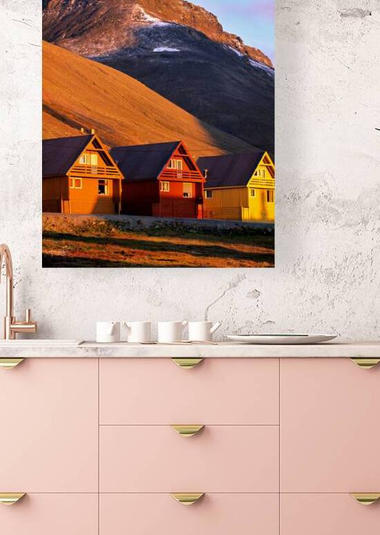 Colorful houses under a mountain in Longyearbyen Svalbard by Marco Brivio