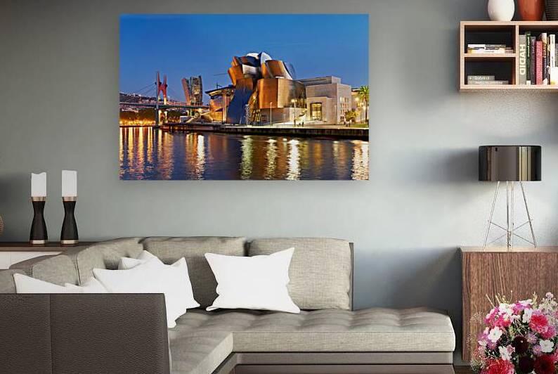 Guggenheim Museum in Bilbao at night with river view by Marco Brivio