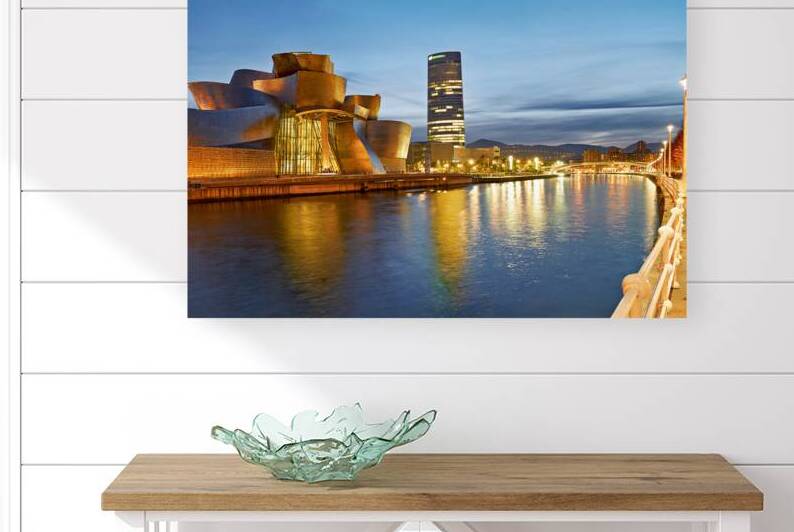Guggenheim Museum view at night in Bilbao Spain by the river by Marco Brivio