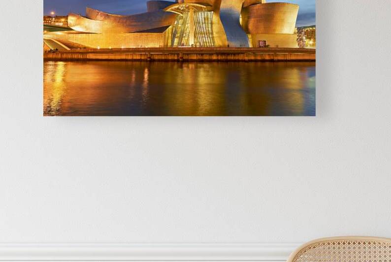 Guggenheim Museum shines at night in Bilbao Spain by Marco Brivio