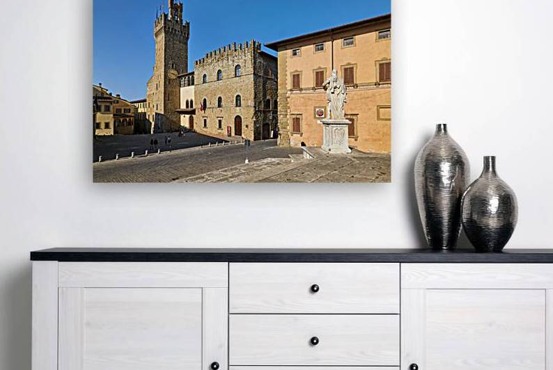 Palazzo dei Priori in Arezzo Tuscany during a clear day by Marco Brivio