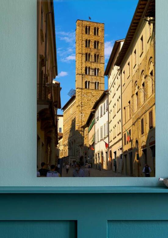 People walk along a street in Arezzo Tuscany Italy by Marco Brivio